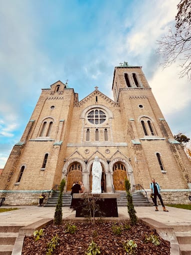 The front steps and statue of St. Ann's Church on an autumn day
